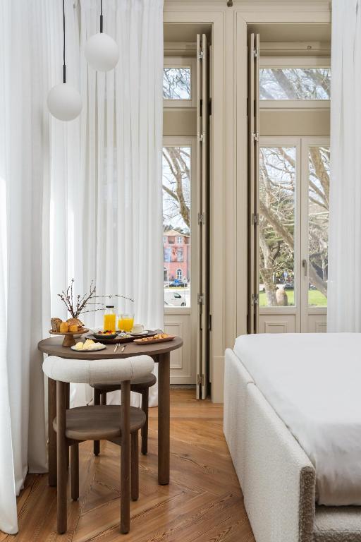 Cama ou camas em um quarto em Artsy Cascais