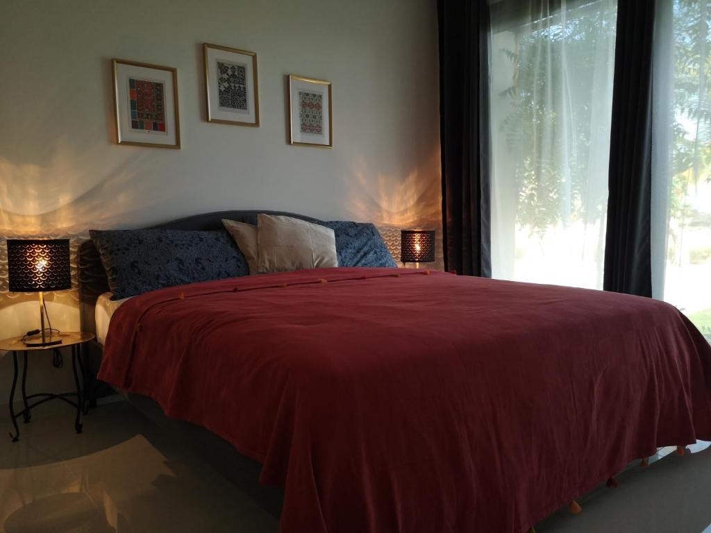 Postel nebo postele na pokoji v ubytování Laguna Apartment HAWANA SALALAH Resort
