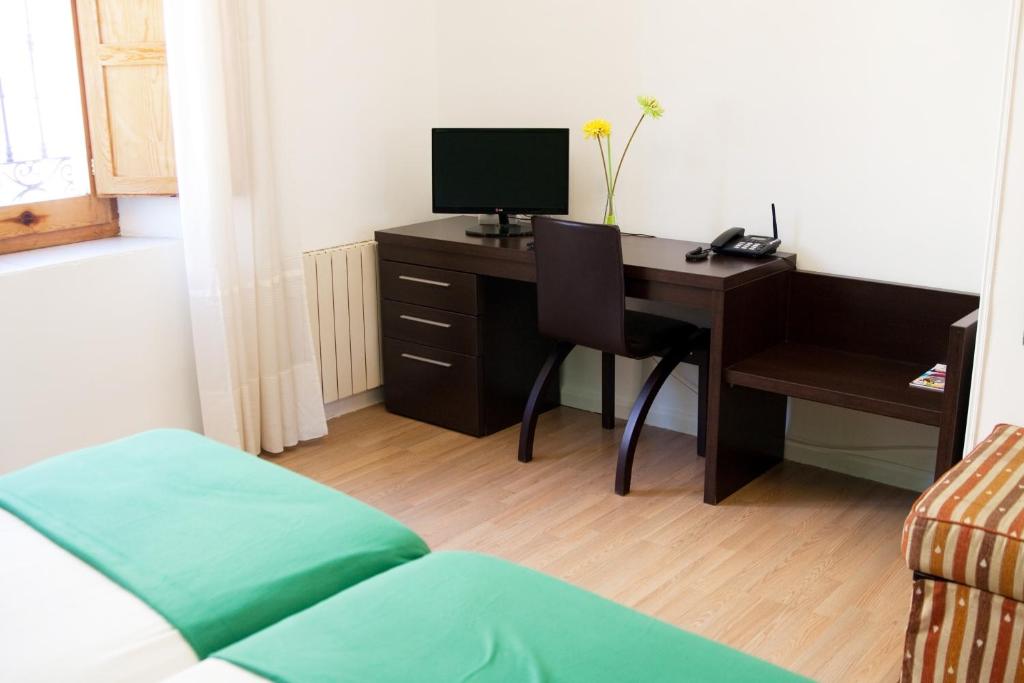 TV a/nebo společenská místnost v ubytování Gran Hostal San Segundo