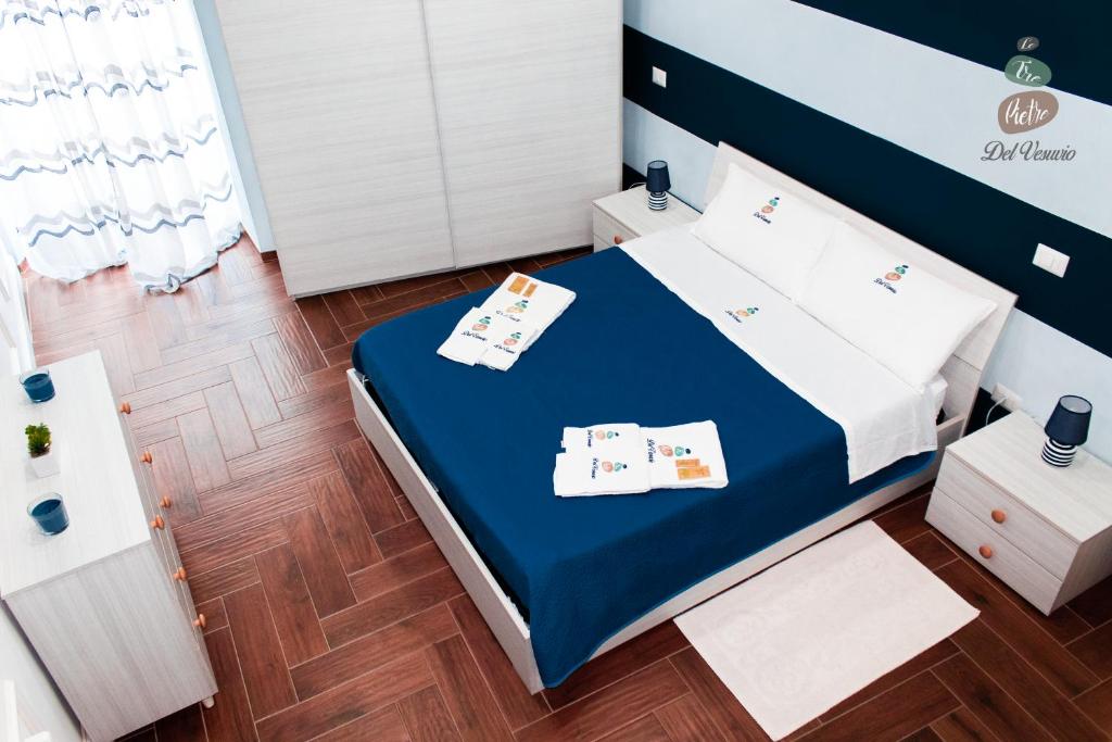 Ліжко або ліжка в номері Le Tre Pietre del Vesuvio