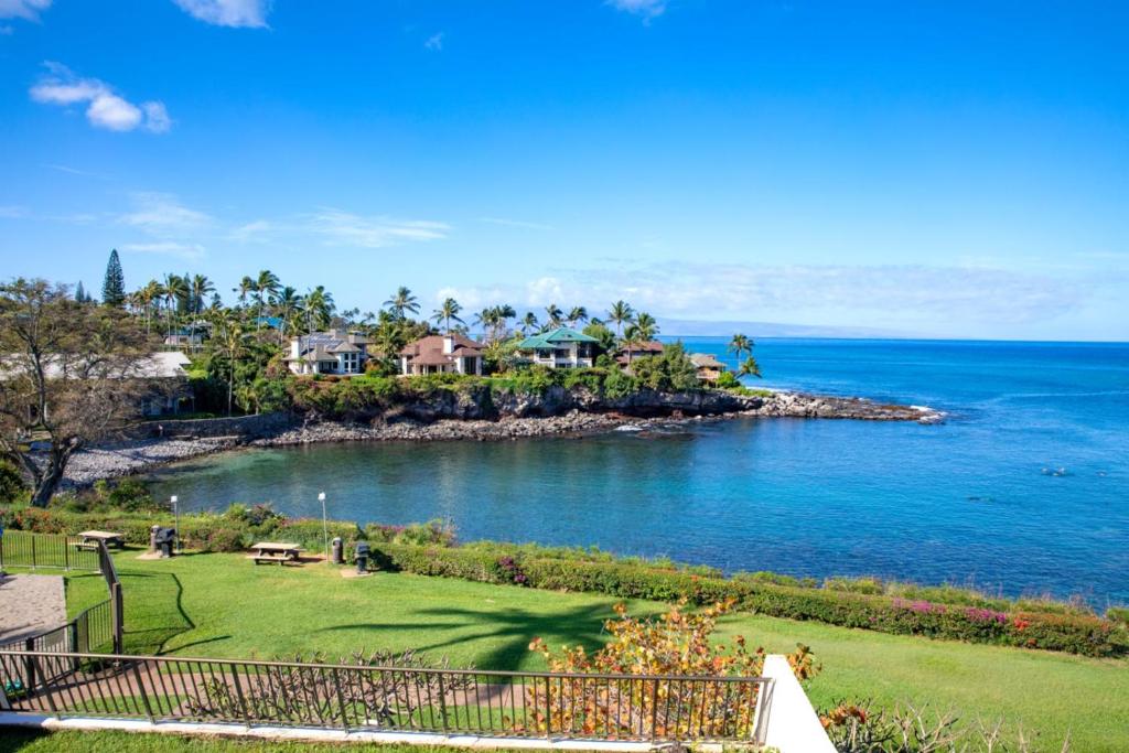 an island in the ocean with houses on it at K B M Resorts Napili Villa C31 Ocean Front 2BDRM in Kapalua