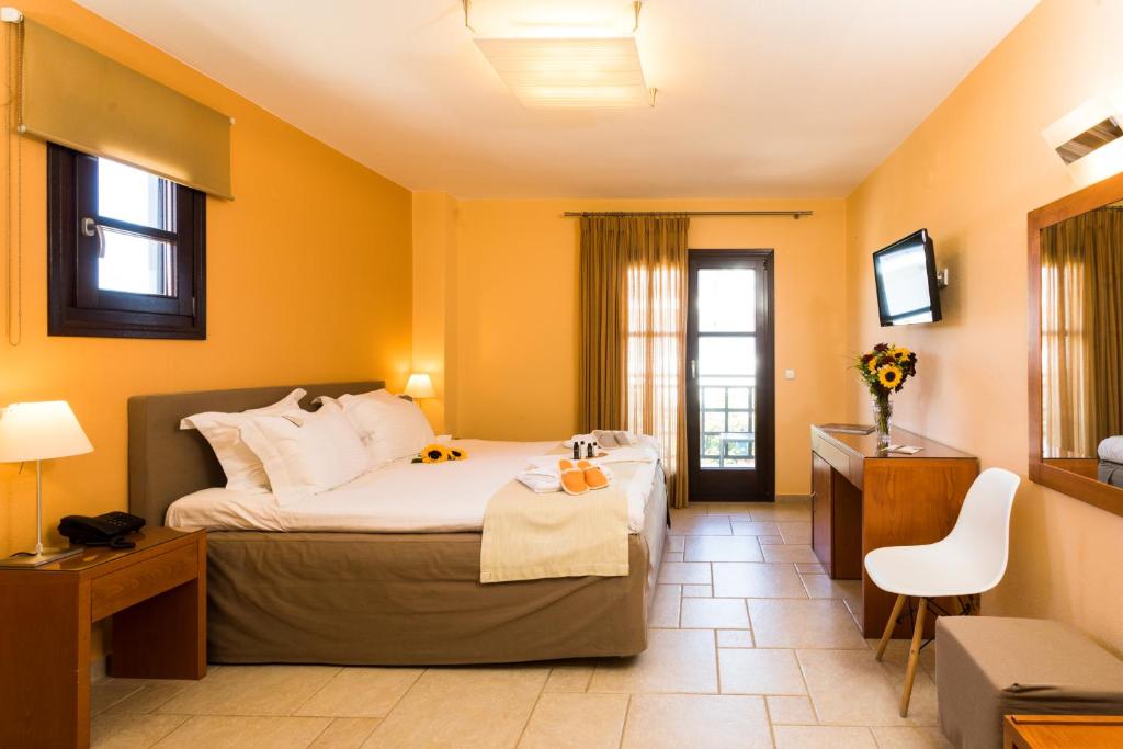 Postel nebo postele na pokoji v ubytování Helianthus Guesthouse
