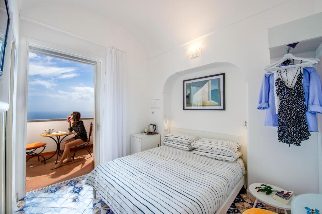 Postel nebo postele na pokoji v ubytování Albadamare Boutique Hotel