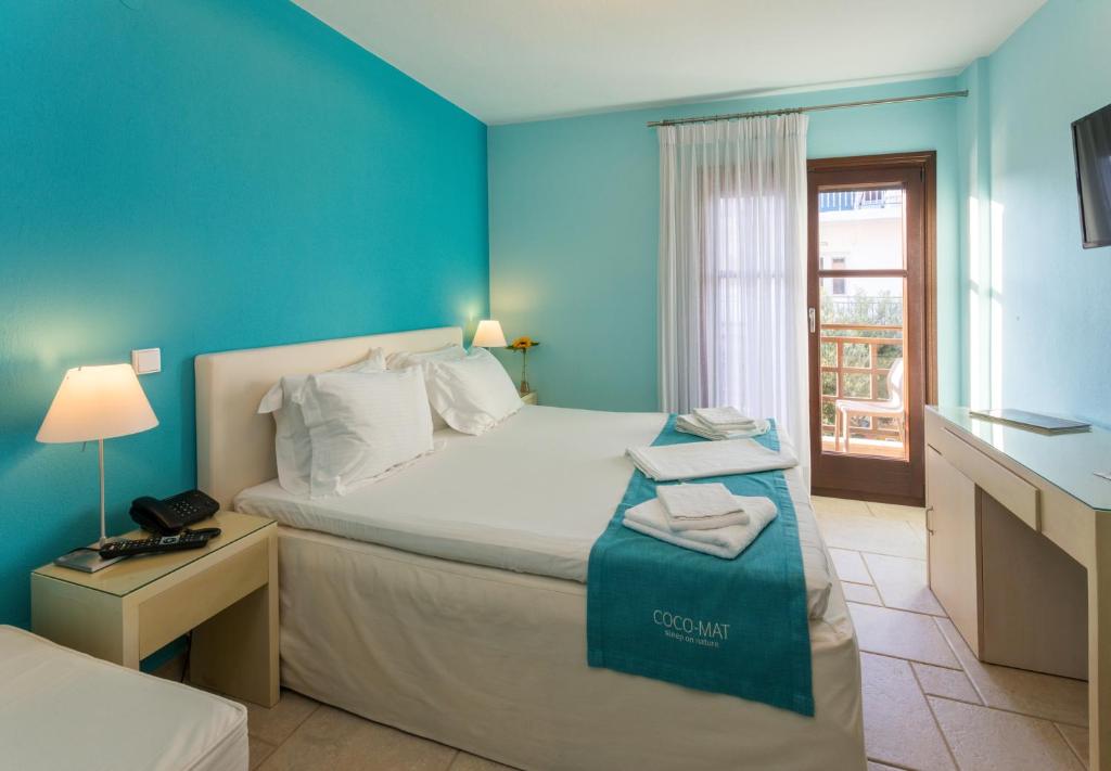 Postel nebo postele na pokoji v ubytování Helianthus Guesthouse