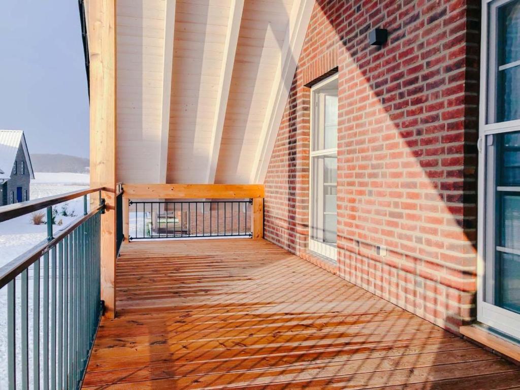 Balkón nebo terasa v ubytování Ferienhaus Familienkoje Rike