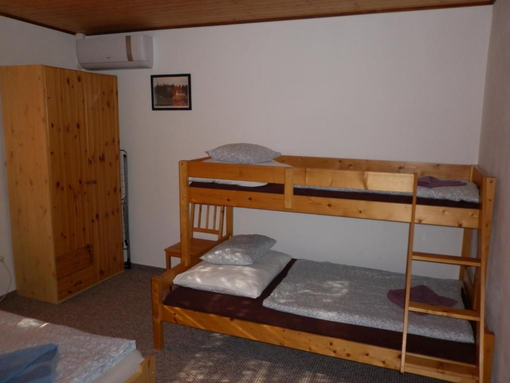 Postel nebo postele na pokoji v ubytování U Zámku