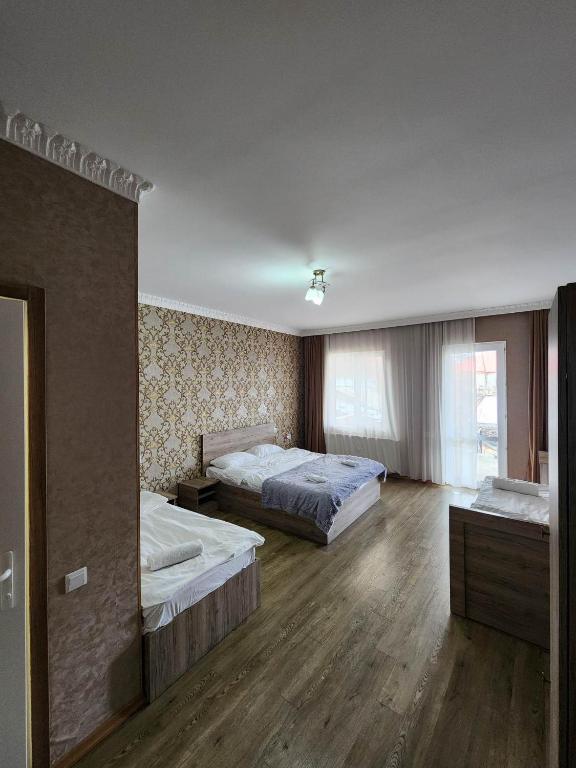 Letto o letti in una camera di MOON NIGHT