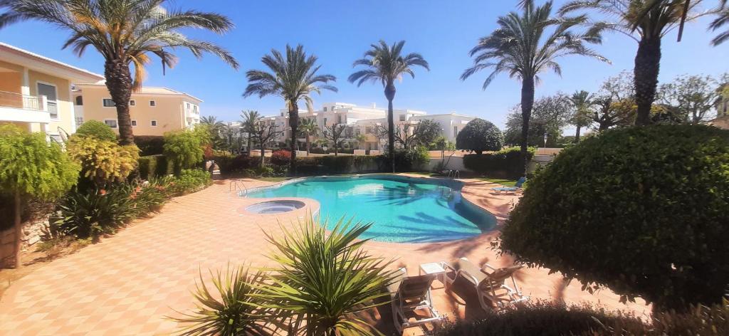 Swimmingpoolen hos eller tæt på Apartamento Buganvilia