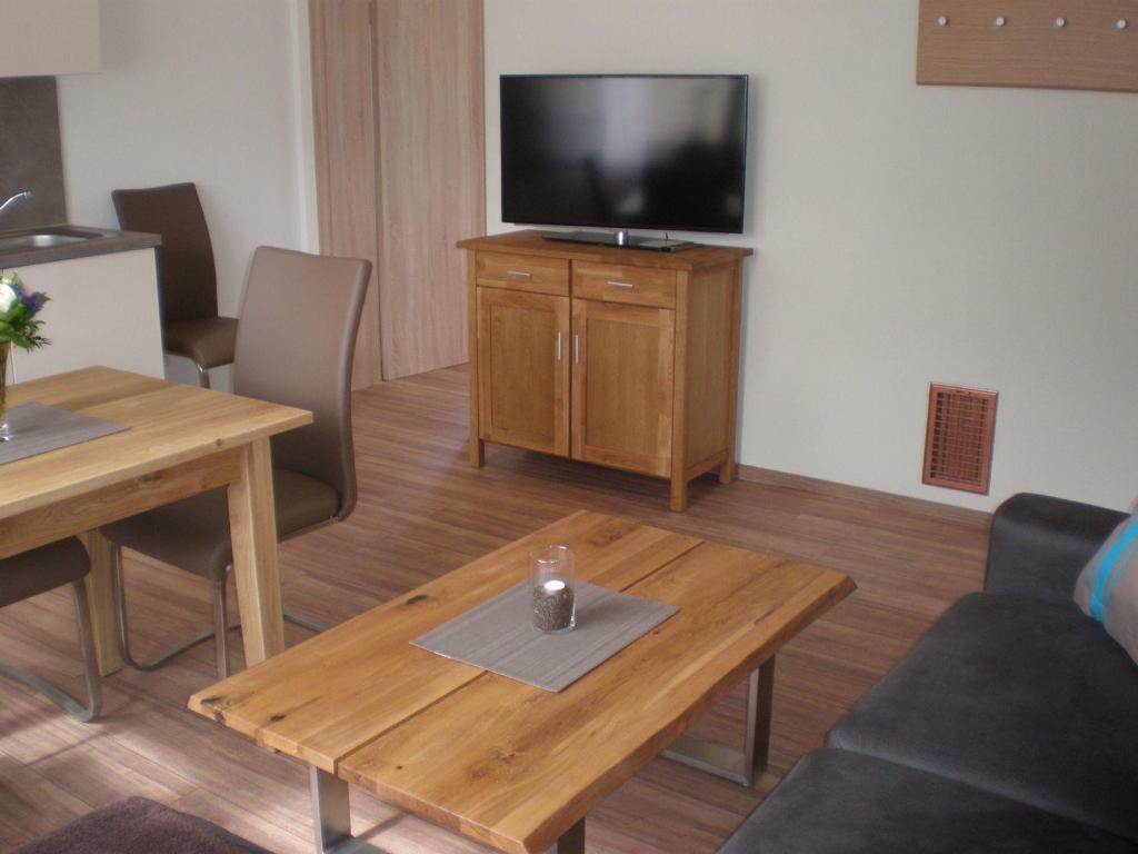 TV a/nebo společenská místnost v ubytování Holiday Home Weingut Mertes