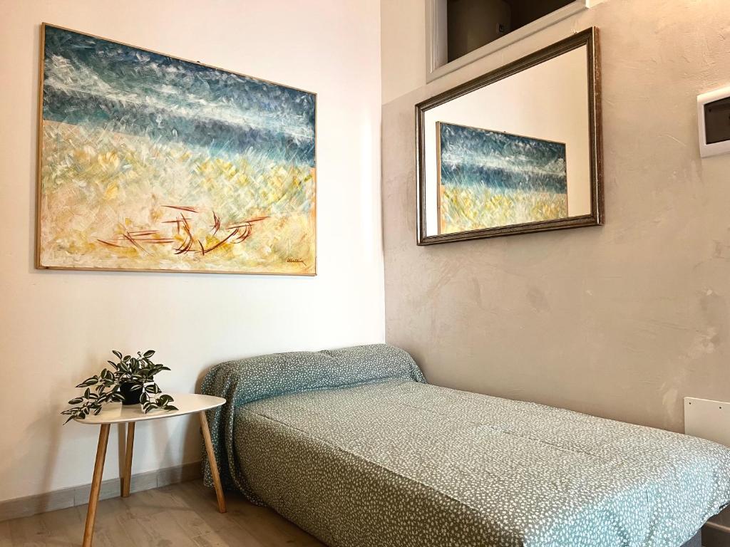Postel nebo postele na pokoji v ubytování Bilocale Nel Centro Storico - Prossimo al Mare
