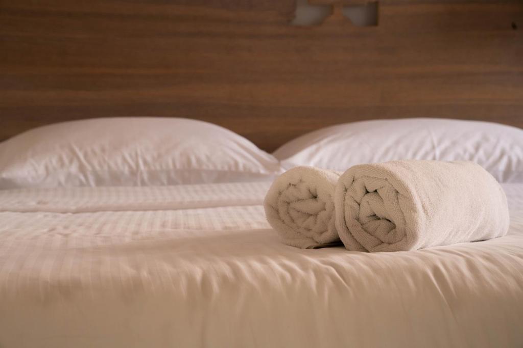 Posteľ alebo postele v izbe v ubytovaní Slavija Culture Heritage Hotel
