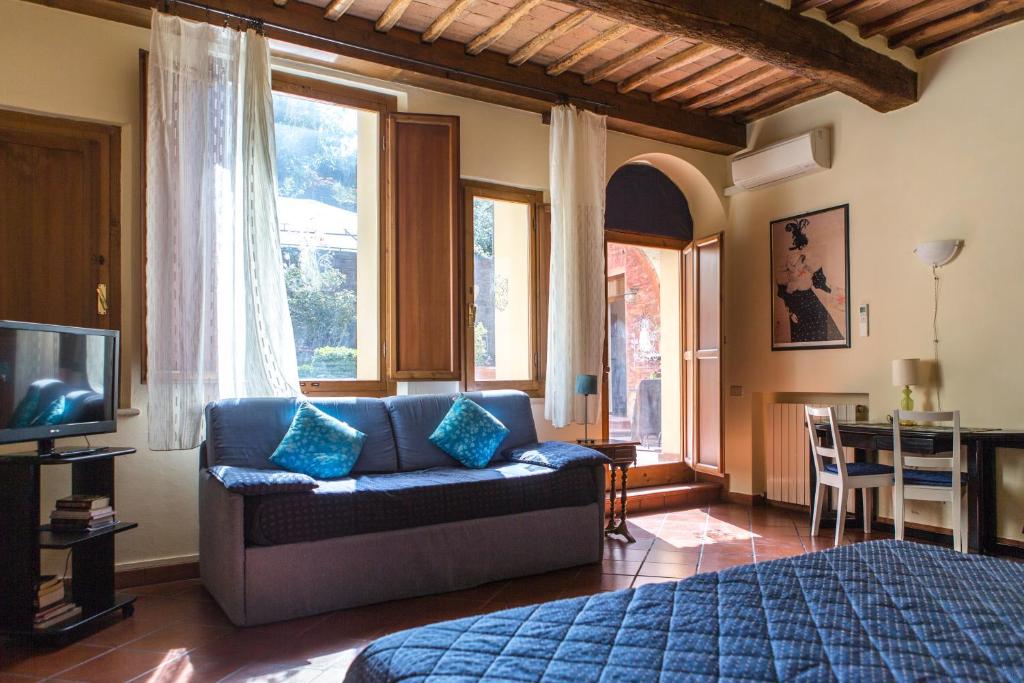 TV a/nebo společenská místnost v ubytování Piazza Paradiso Accommodation