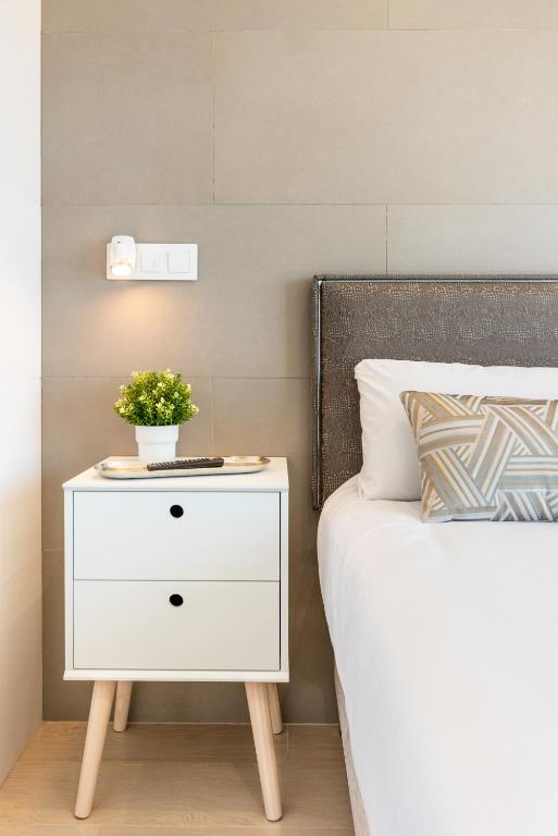 Postel nebo postele na pokoji v ubytování WintowinRentals Apartamento Suite en Ocean House