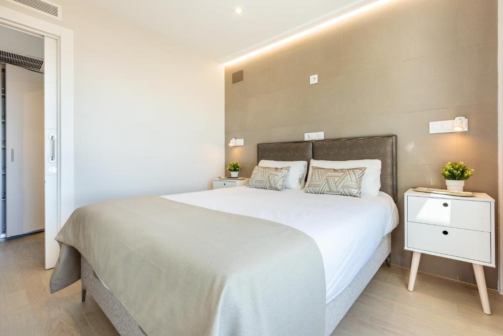 Postel nebo postele na pokoji v ubytování WintowinRentals Apartamento Suite en Ocean House