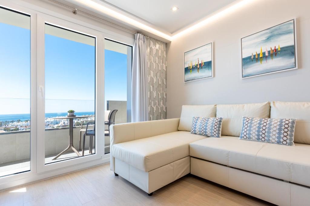 Posezení v ubytování WintowinRentals Apartamento Suite en Ocean House