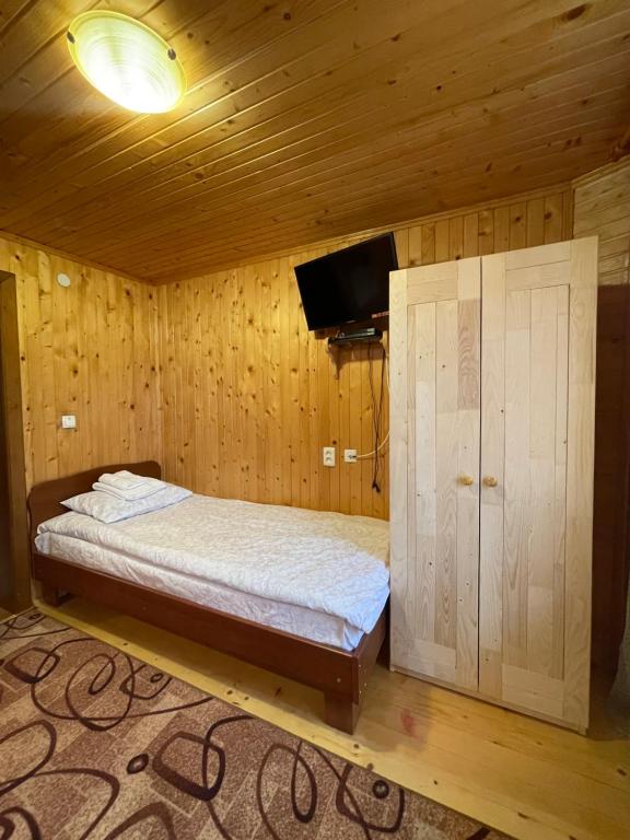 Postel nebo postele na pokoji v ubytování Made in Yaremche
