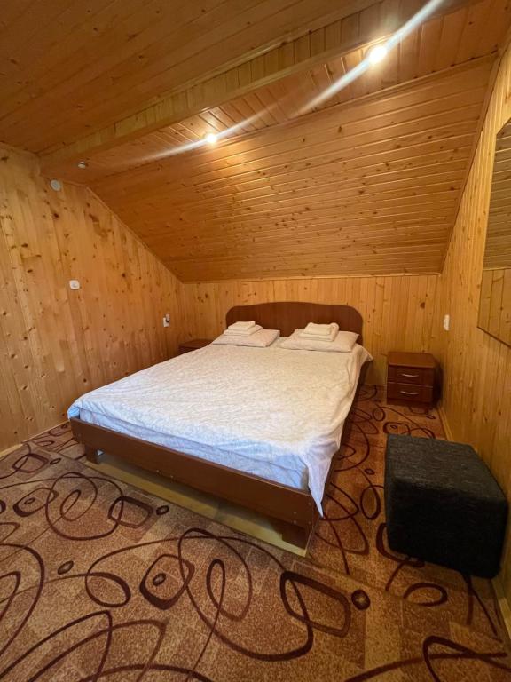 Postel nebo postele na pokoji v ubytování Made in Yaremche