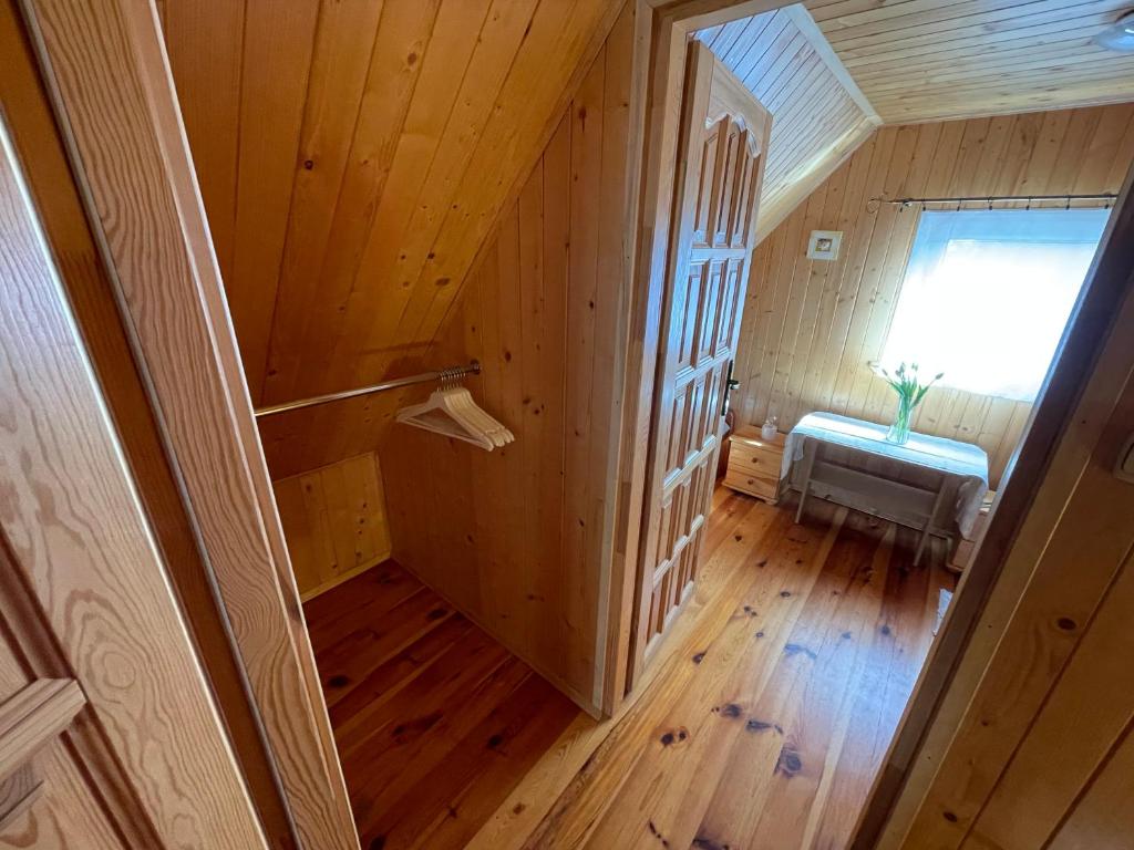 Postel nebo postele na pokoji v ubytování Domek Danusia z dwiema sypialniami