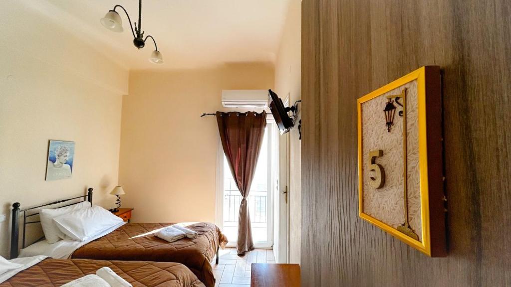 Postel nebo postele na pokoji v ubytování Central 9 Rooms
