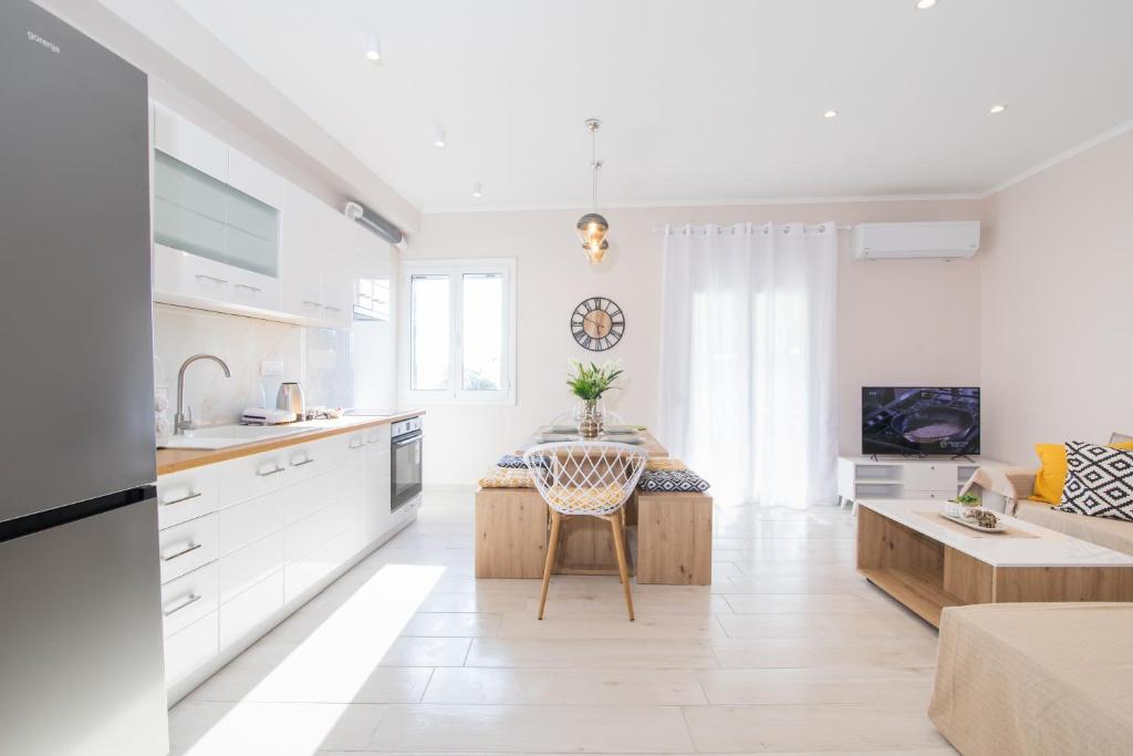 Kuchyň nebo kuchyňský kout v ubytování Corfu City Apartments