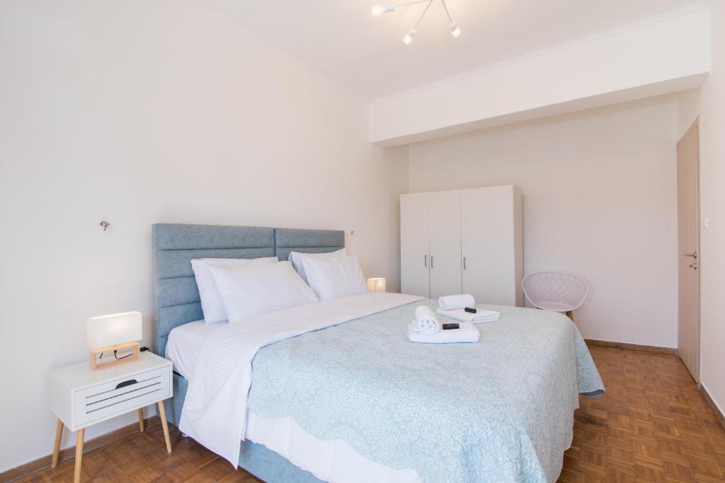 Postel nebo postele na pokoji v ubytování Corfu City Apartments