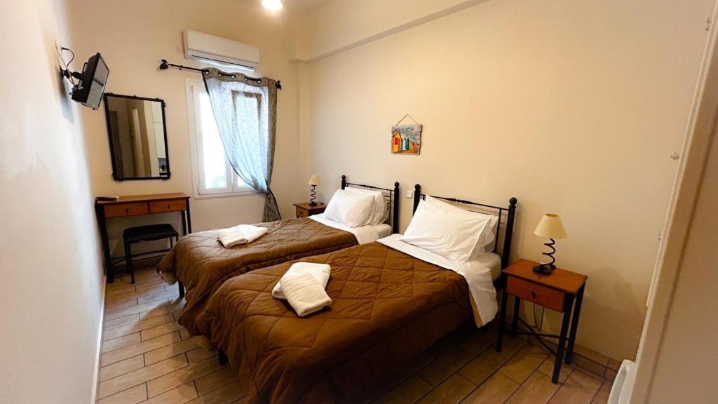 Postel nebo postele na pokoji v ubytování Central 9 Rooms