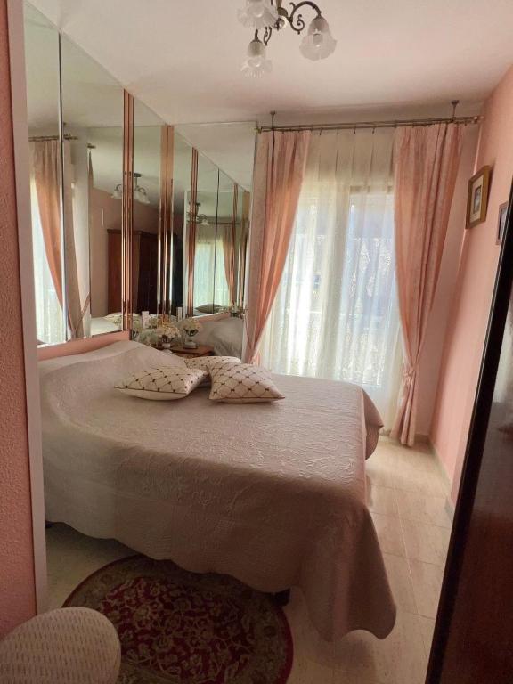 Posteľ alebo postele v izbe v ubytovaní Apartament Montana