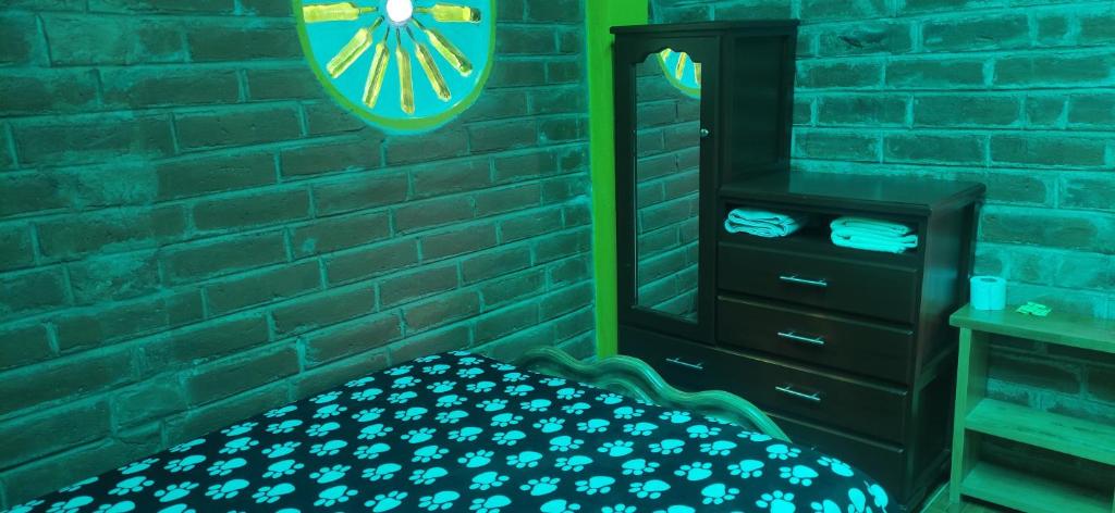 Postel nebo postele na pokoji v ubytování Hostal el Vaquero