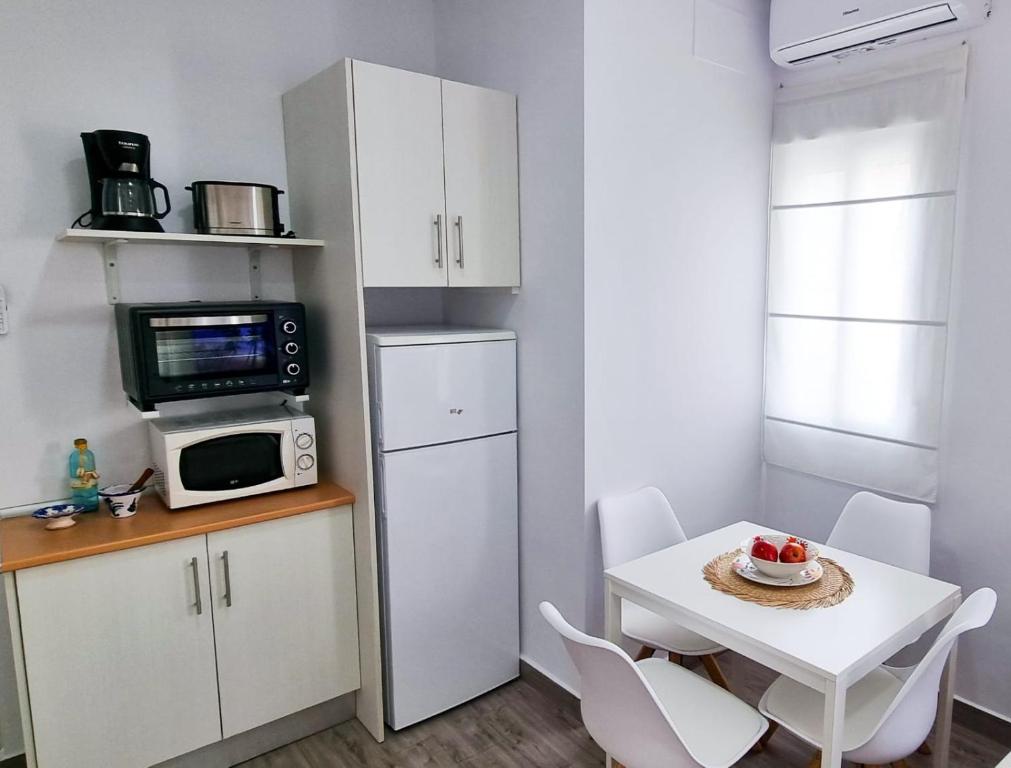 Kuchyňa alebo kuchynka v ubytovaní Cozy & Quiet Apartment Capitán Huelin