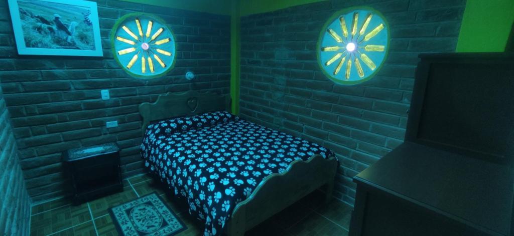 Postel nebo postele na pokoji v ubytování Hostal el Vaquero