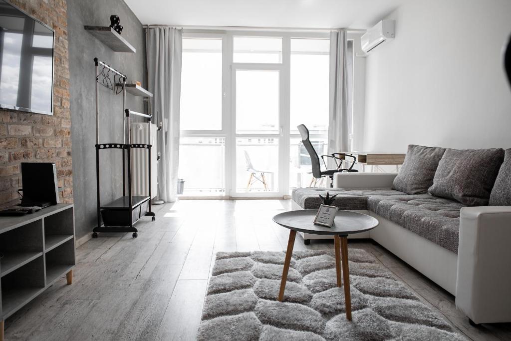 Posezení v ubytování Városi Apartman
