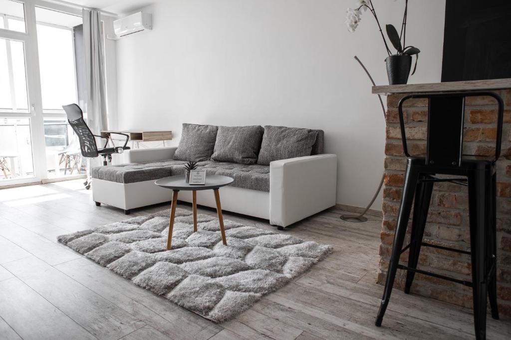 Posezení v ubytování Városi Apartman