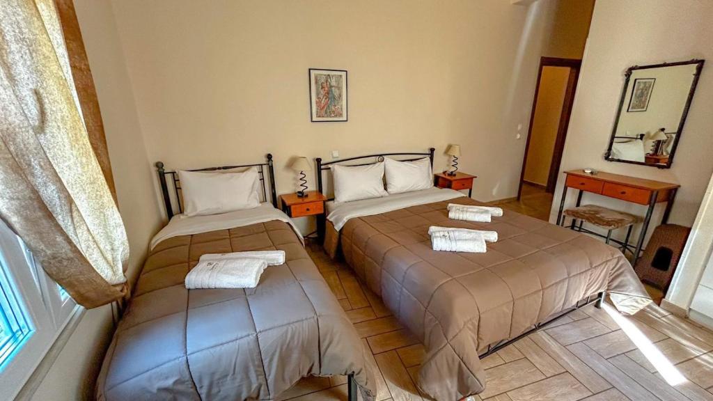 Postel nebo postele na pokoji v ubytování Central 9 Rooms