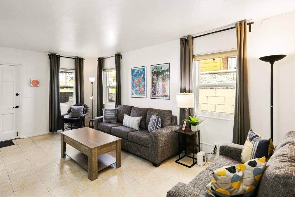 a living room with a couch and a table at 210 Forty Fourth Street in Newport Beach