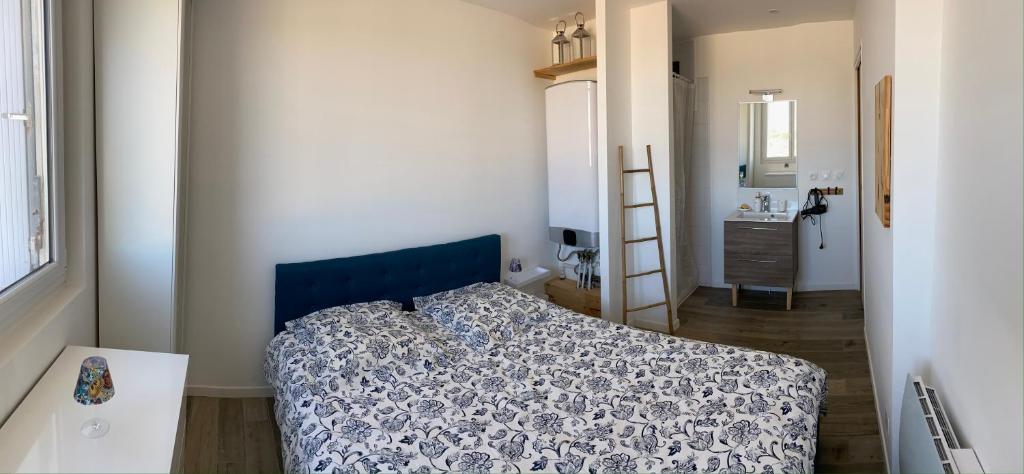 Postel nebo postele na pokoji v ubytování Appartement 2P à 1 min de la mer