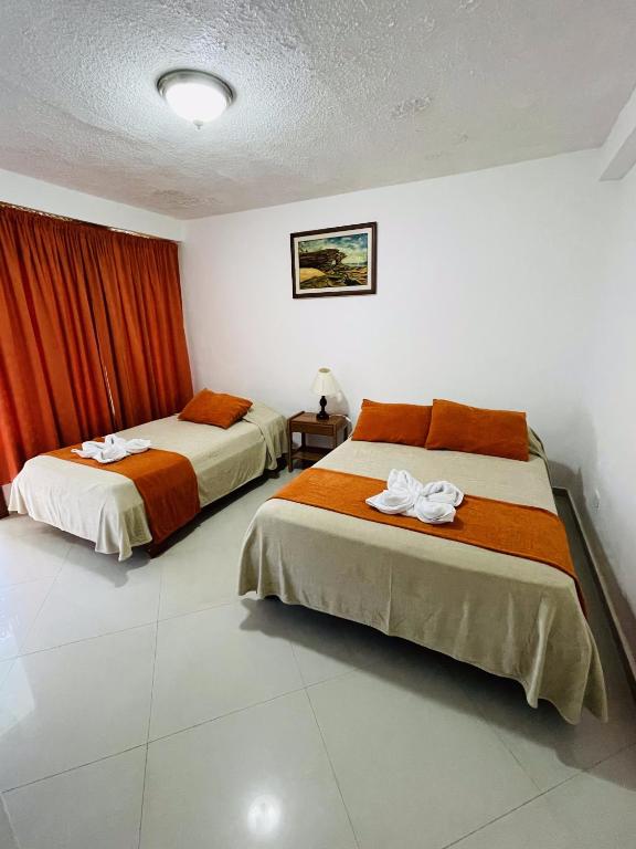 Postel nebo postele na pokoji v ubytování Fernandina Hotel & Spa