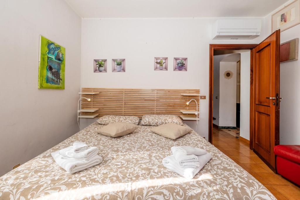 Posteľ alebo postele v izbe v ubytovaní Villa Teresa a due passi da Finalborgo