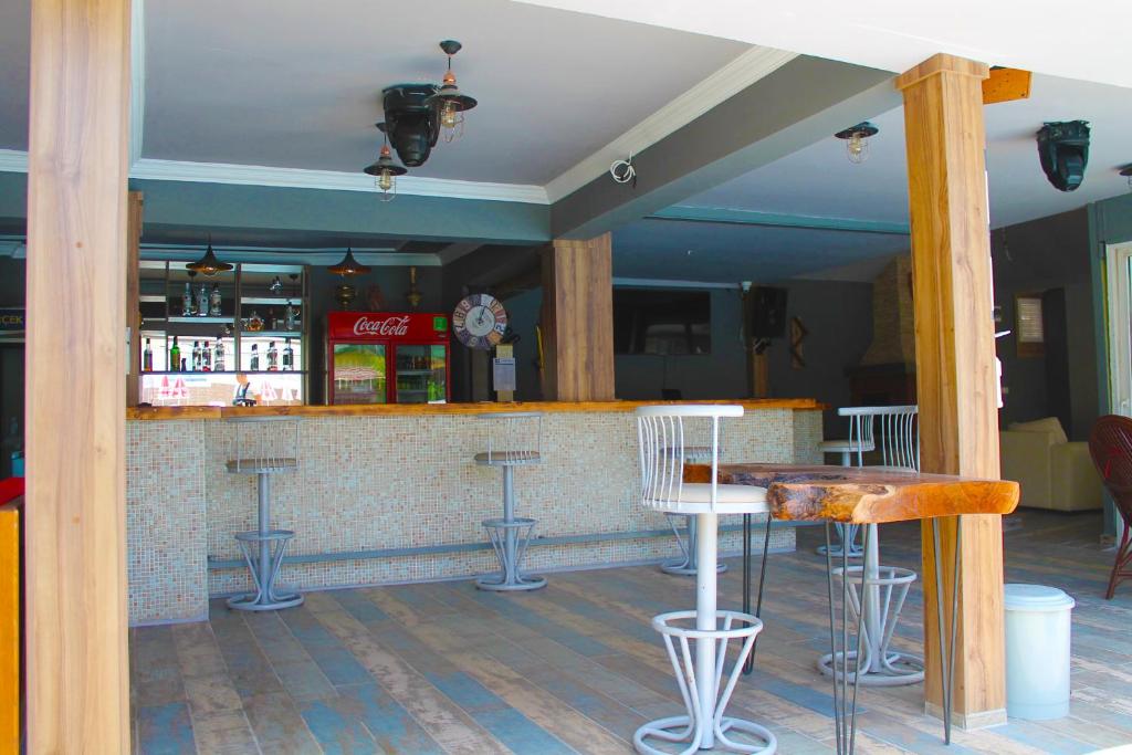 Lounge nebo bar v ubytování Carmina Hotel