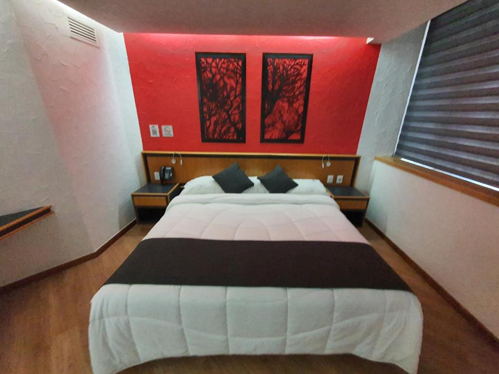 Postel nebo postele na pokoji v ubytování Hotel Alcampo