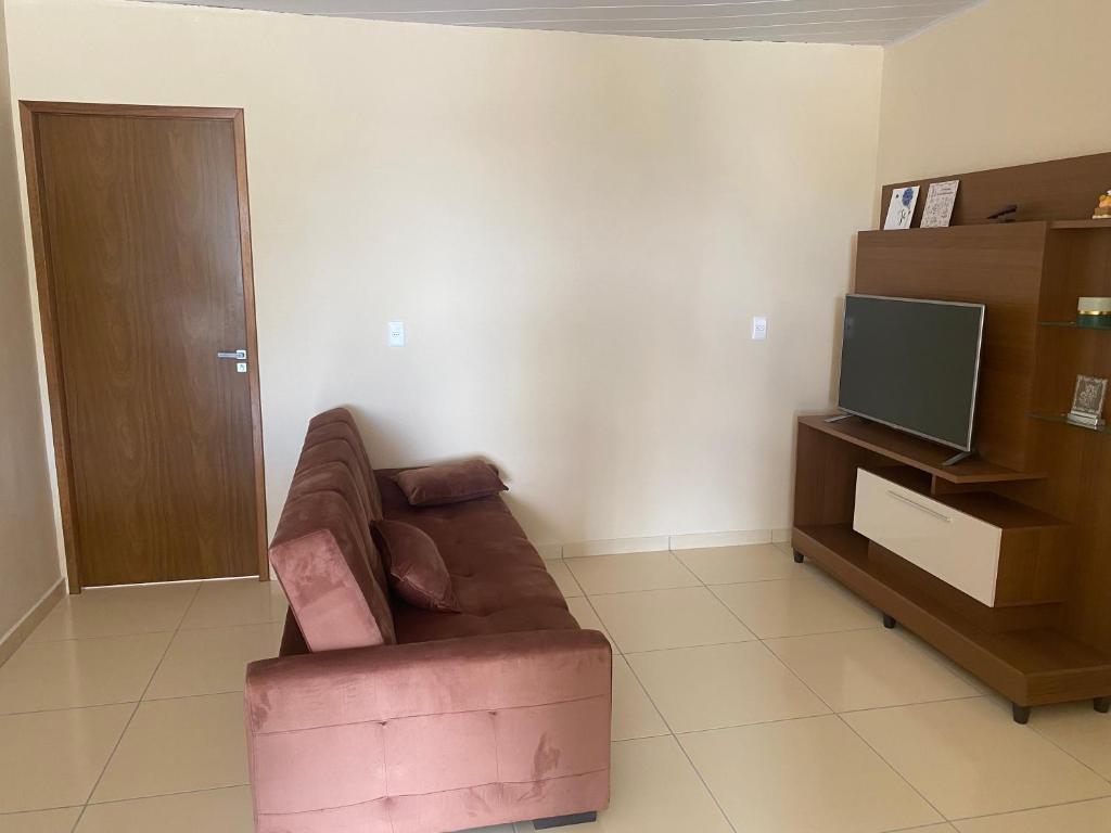 Televisyen dan/atau pusat hiburan di Apartamento muito bem localizado a 200 metros da praca mestre dominguinhos