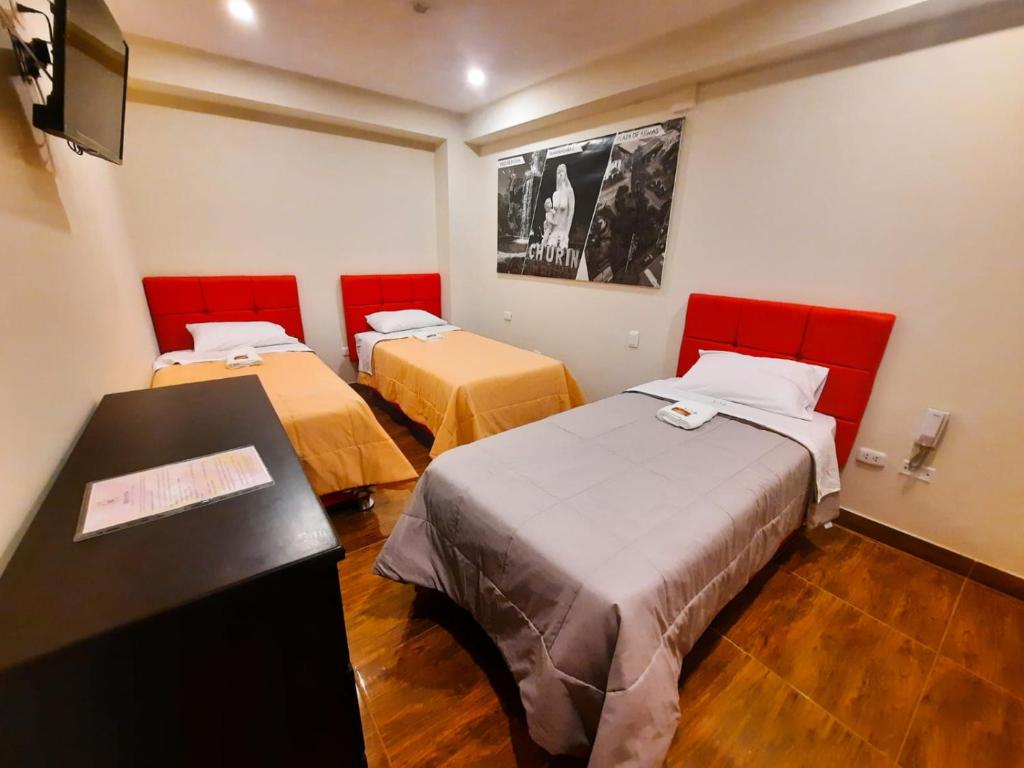 Postel nebo postele na pokoji v ubytování Brianny Hotel