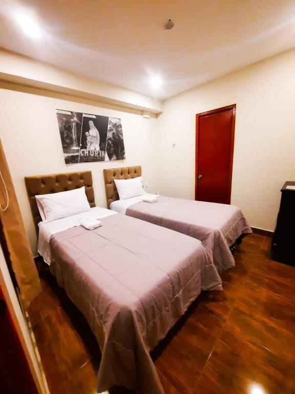 Postel nebo postele na pokoji v ubytování Brianny Hotel