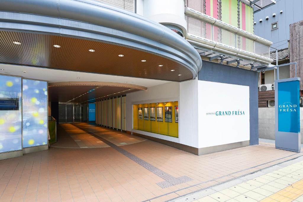 a hallway of a building with a building at Sotetsu Grand Fresa Osaka-Namba in Osaka