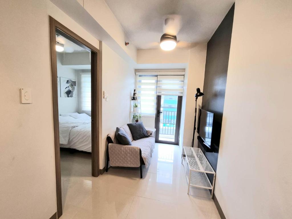 1BR Cozy Condotel near IKEA, Mall of Asia & SMX