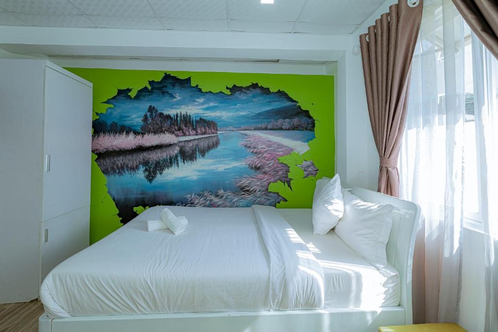 Postel nebo postele na pokoji v ubytování Ken's Backpackers Hotel