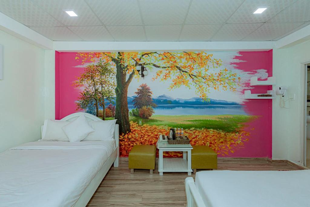 Postel nebo postele na pokoji v ubytování Ken's Backpackers Hotel
