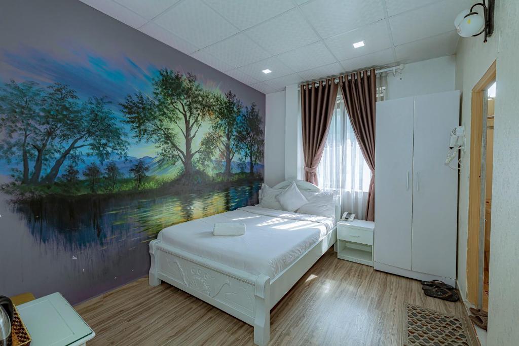 Postel nebo postele na pokoji v ubytování Ken's Backpackers Hotel