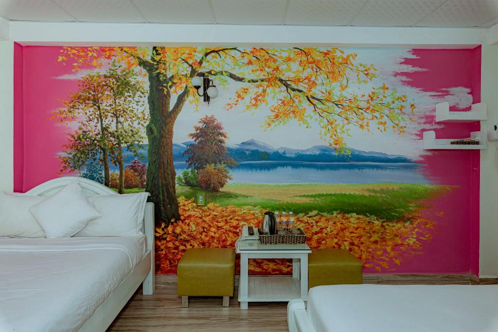 Postel nebo postele na pokoji v ubytování Ken's Backpackers Hotel
