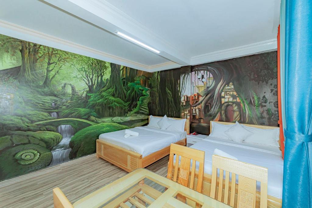 Postel nebo postele na pokoji v ubytování Ken's Backpackers Hotel