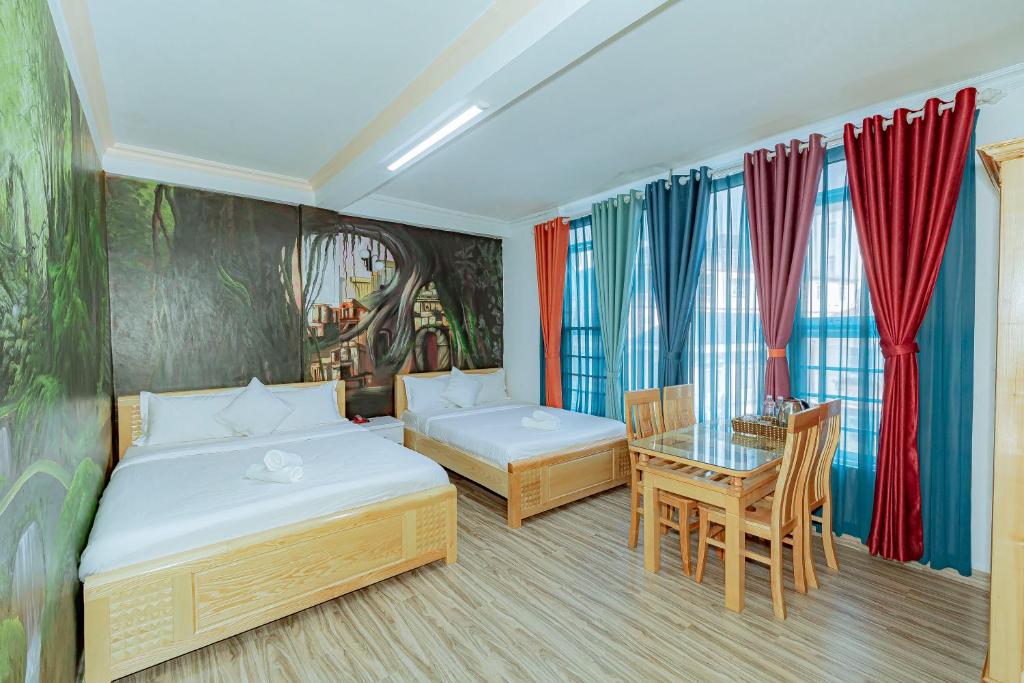 Postel nebo postele na pokoji v ubytování Ken's Backpackers Hotel